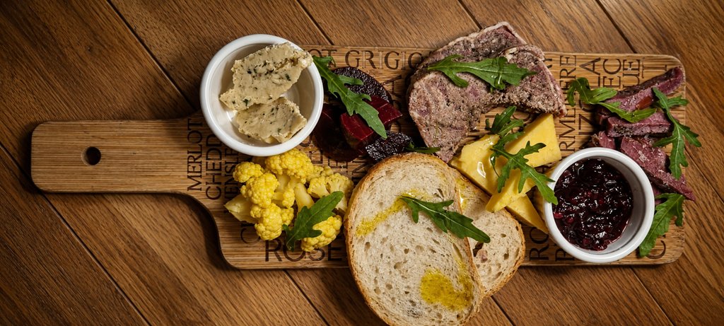 On the lunch menu, Crofter's cold platter  with our smoked pigeon breast, game terrine, pickles, chutney, cheddar, bone marrow